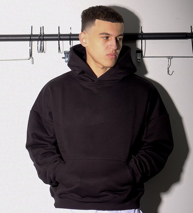 FROST black oversized boxy fit pullover blank hoodie. Made from 100% cotton, 500GSM heavyweight fabric, with a cropped & boxy fit.