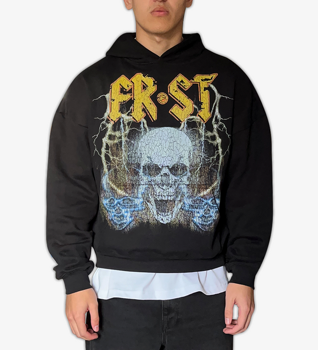 Black oversized boxy fit pullover hoodie named 'Rockstar Hoodie' featuring a vintage-inspired AC/DC-style graphic print on the front. Made from 100% cotton, 500GSM heavyweight fabric, designed to replicate classic band tee aesthetics