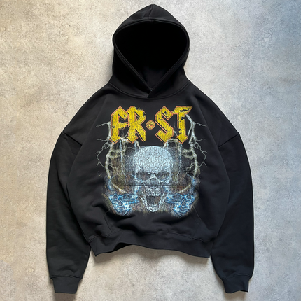Black oversized boxy fit pullover hoodie named 'Rockstar Hoodie' featuring a vintage-inspired AC/DC-style graphic print on the front. Made from 100% cotton, 500GSM heavyweight fabric, designed to replicate classic band tee aesthetics