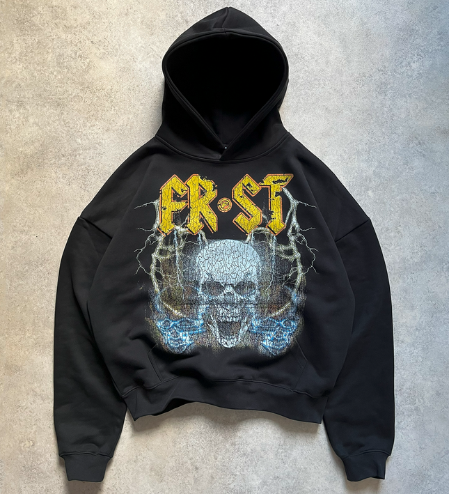 Black oversized boxy fit pullover hoodie named 'Rockstar Hoodie' featuring a vintage-inspired AC/DC-style graphic print on the front. Made from 100% cotton, 500GSM heavyweight fabric, designed to replicate classic band tee aesthetics