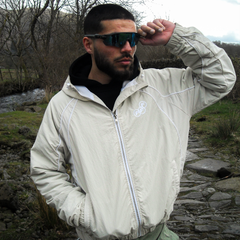 Frost clothing Grey and Green Marty Supreme Windbreaker. Made of crinkle nylon with waterproof properties.